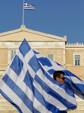 <p>
	Днес е денят за размисъл, а утре - съдбоносният ден за Гърция.<em> Снимка: Ройтерс</em></p>
