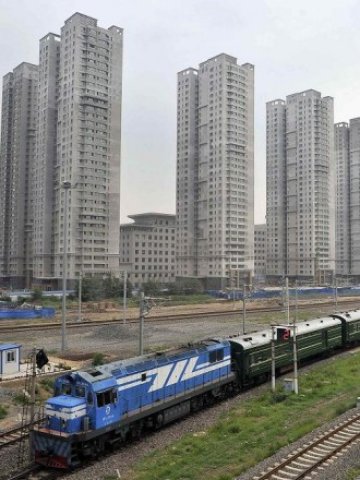 <p>
	Жилищни сгради в Китай. <em>Снимка: Ройтерс</em></p>
