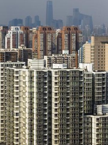 <p>Жилищни сгради в Пекин. <i>Снимка: БТА</i></p>