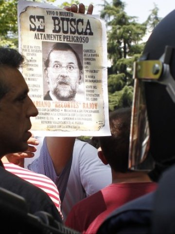 <p>
	<em>Протест срещу мерките за бюджетни икономии, Мадрид, 27 юли 2012 г. Снимка: Ройтерс</em></p>
