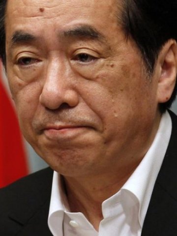 <p>
	Наото Кан. <em>Снимка: Ройтерс</em></p>
