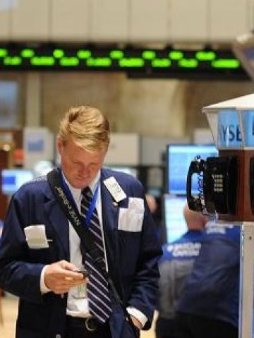 <p>Брокер на Нюйоркската фондова борса. Снимка: БТА</p>