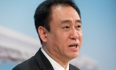 Основателят на Evergrande беше осъден на доживотен затвор заради измами 