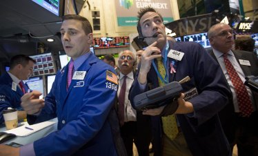 Страхът около AI и напрежението с Иран разколебават трейдърите на Wall Street*