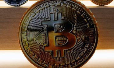 Завърналият се апетит към риск тласна цената на биткойн до над 86 хил. долара