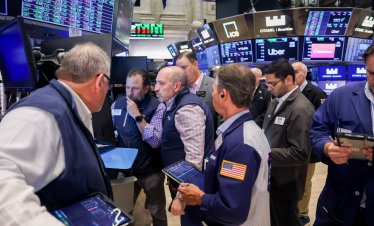 Dow се покачва с над 500 пункта, подкрепен от спадащите цени на петрола*