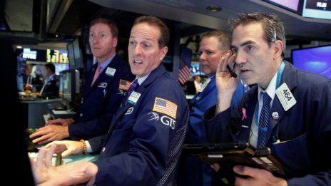 Протоколът на Фед успокои Wall Street