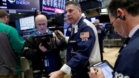 Волатилна търговия на Wall Street след публикуването на протокола на Фед