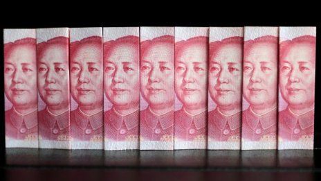 Пекин понижи фиксинга на юана към долара до петгодишно дъно