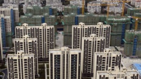 Китай смекчи още ограничения за имотните заеми заради забавянето на пазара