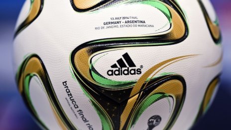 Adidas намали прогнозата за печалбата си за 2014 г.