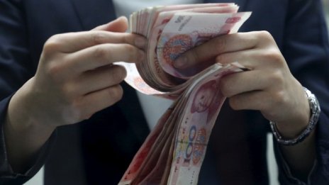 Китай ограничава международните инвестиции на местните си компании