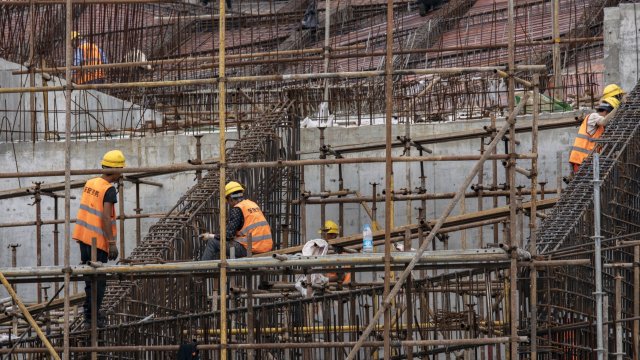 Старите сгради и новото строителство са отговорни за две пети от свързаните с енергията въглеродни емисии. Снимка: Qilai Shen/Bloomberg