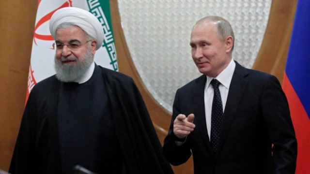 <p>
	Президентът на Иран Хасан Рохани и руският държавен глава Владимир Путин.&nbsp;<em>Снимка: Ройтерс</em></p>
