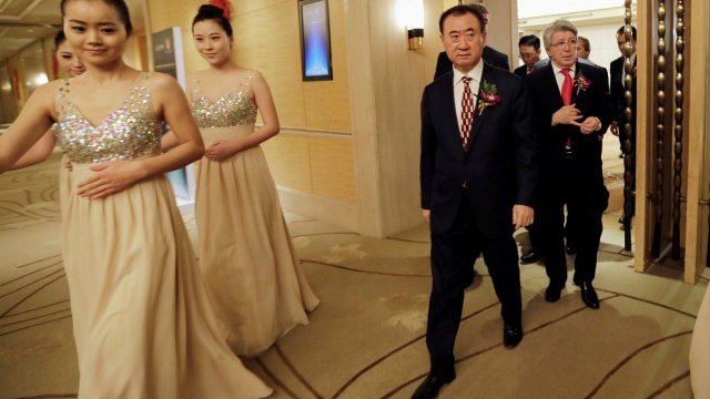 <p>
	Уан Дзиенлин. <em>Снимка: Ройтерс</em></p>
