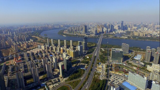 <p>
	Изглед към икономическия център на Шанян. <em>Снимка: Ройтерс</em></p>
