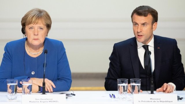 <p>
	Германският канцлер Ангела Меркел (вляво) и френският президент Еманюел Макрон (вдясно). Снимка: Christophe Morin/Bloomberg</p>
