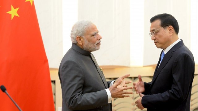 <p>
	Моди и Ли Къцян. <em>Снимка: Ройтерс</em></p>
