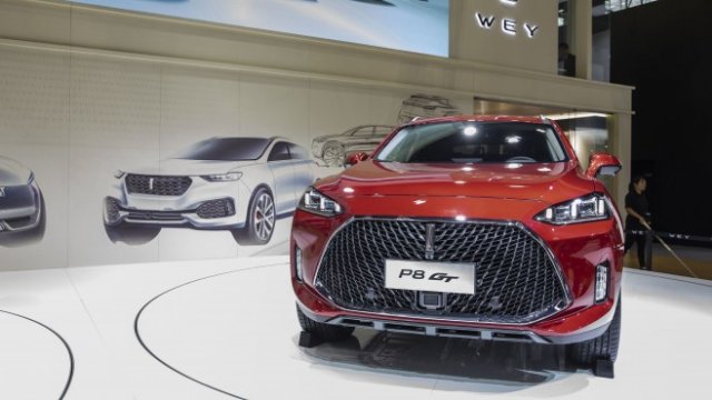 <p>
	Хибридният модел WEY P8 GT на Great Wall Motor Co., представен на изложението в Гуанджоу, Китай, през 2018 г. <em>Снимка:&nbsp;Qilai Shen/Bloomberg</em></p>
