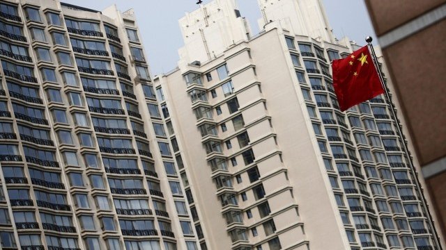 <p>
	Нов жилищен комплекс в Пекин. <em>Снимка: Ройтерс</em></p>
