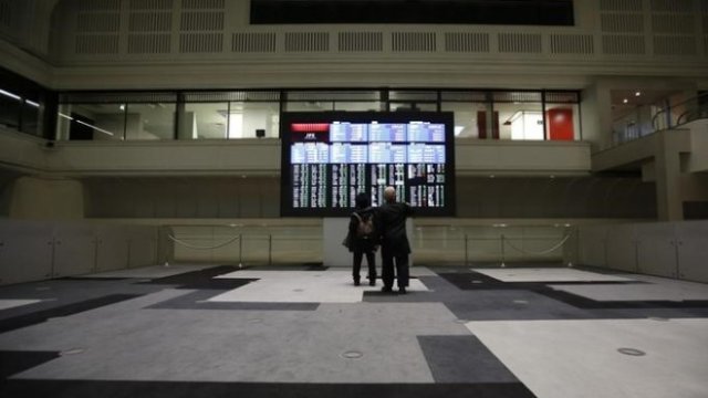 <p>
	Сградата на фондовата борса в Токио. <em>Снимка: Ройтерс</em></p>
