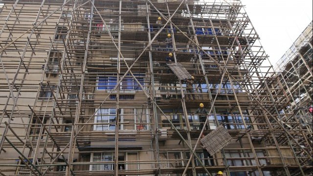 <p>
	Строителен обект в Шанхай. <em>Снимка: Ройтерс</em></p>
