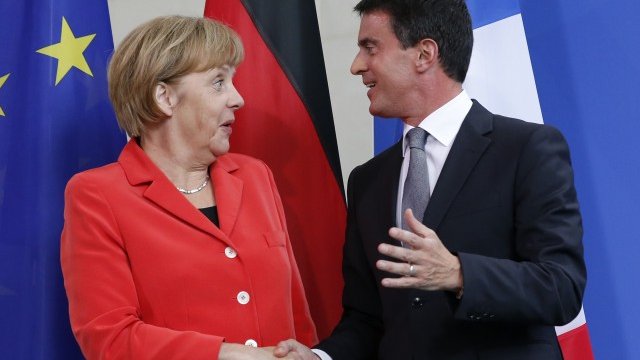 <p>
	Ангела Меркел и Манюел Валс. <em>Снимка: Ройтерс</em></p>
