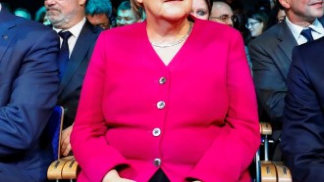<p>
	Германският канцлер Ангела Меркел по време на официалното откриване на автомобилното изложение<em>. Снимка: Ройтерс</em></p>
