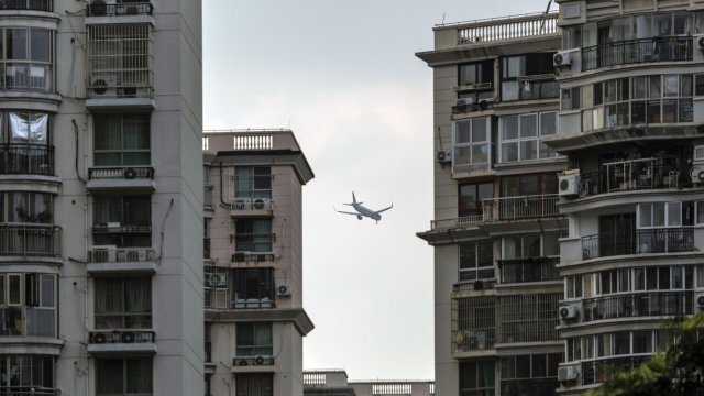 Строителството на апартаменти с обща площ от 500 млн. кв. м е спряно заради ликвидната криза при строителните компании. Снимка: Bloomberg LP