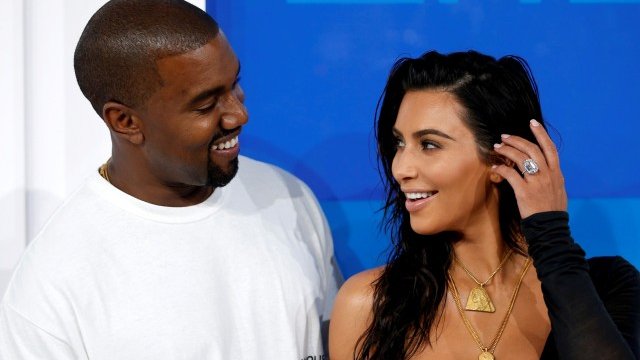 <p>
	Ким Кардашиян и съпругът ѝ Кание Уест.<em> Снимка: Ройтерс</em></p>
