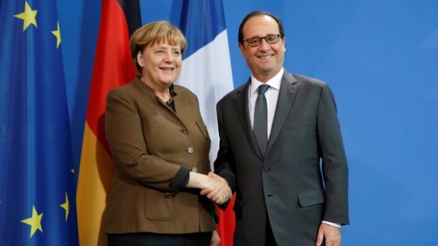 <p>
	Ангела Меркел и Франсоа Оланд. Снимка: <em>Ройтерс</em></p>
