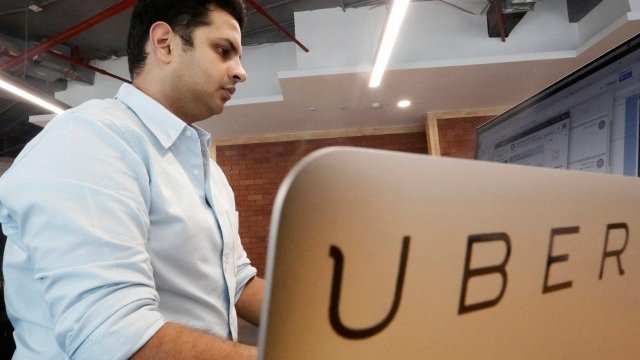 <p>
	Oфис на Uber в близост до Ню Делхи, Индия. <em>Снимка: Ройтерс</em></p>
