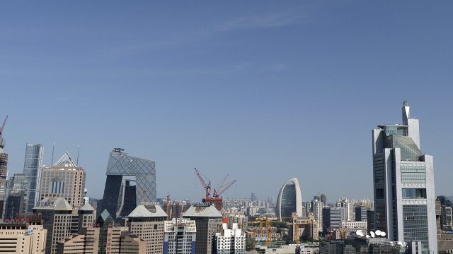 <p>
	Бизнес център в Пекин. <em>Снимка: Ройтерс</em></p>
