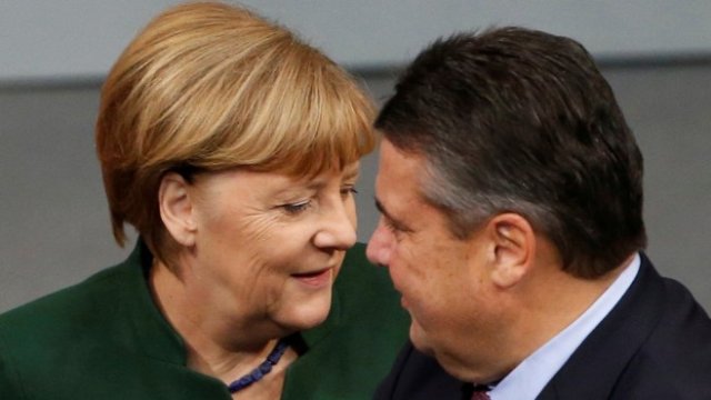 <p>
	Ангела Меркел и Зигмар Габриел. Снимка: <em>архив Ройтерс</em></p>
