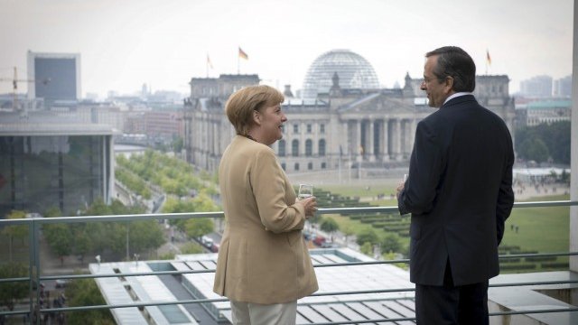 <p>
	Меркел не отстъпва пред исканията на Самарас. <em>Снимка: Ройтерс</em></p>
