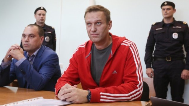 <p>
	Навални на един от процесите срещу него. <em>Снимка: Andrey Rudakov/Bloomberg</em></p>
