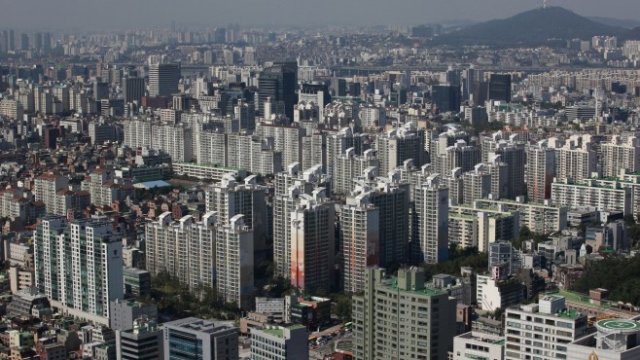 <p>
	Кварталът Гангнам в Сеул. <em>Снимка: Ройтерс</em></p>
