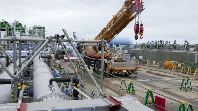 Кадър от медийна обиколка на ядрената електроцентрала. Снимка: Kimimasa Mayama/EPA/Bloomberg