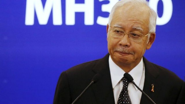 <p>
	Премиерът на Малайзия обяви резултатите от експертизата на пресконференция. <em>Снимка: Ройтерс</em></p>
