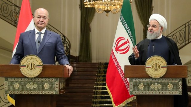 <p>
	Бархам Салих (вляво) и&nbsp;Хасан Рохани (вдясно) <em>Снимка: Ройтерс</em></p>
