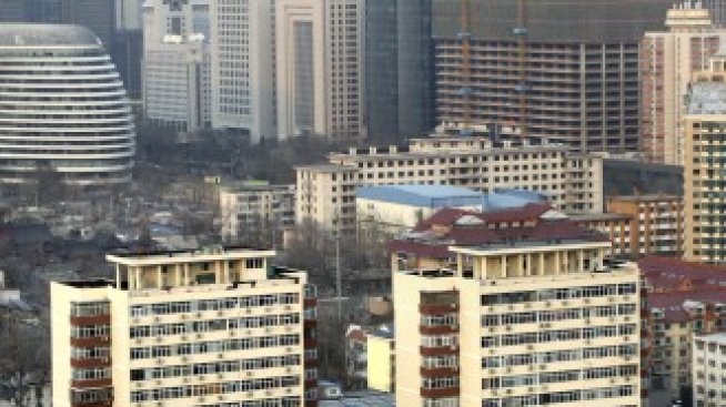 Инвестициите в имоти в Китай се забавят през декември