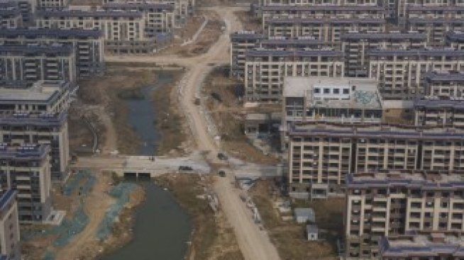 Китайските строителни компании дължат 1,3 млрд. долара по облигации през декември