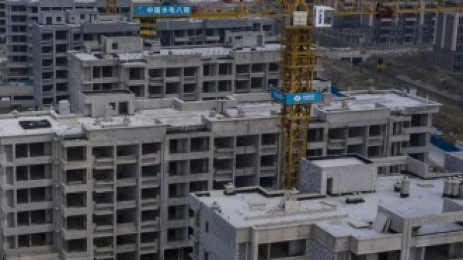 Evergrande възобнови работата по над десет имотни проекта