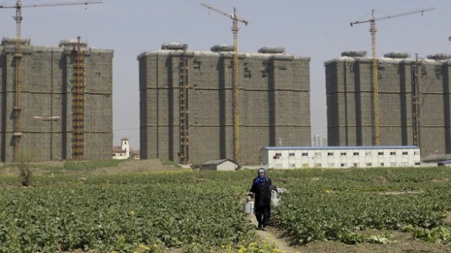 Местните власти в Китай и правителството в спор за жилищния пазар