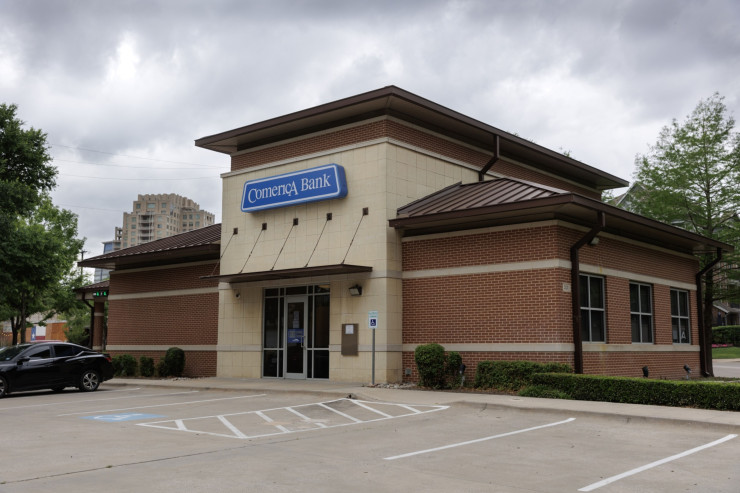 Comerica заяви, че въпреки че депозитите ѝ са намалели през първото тримесечие, те са останали над нивата отпреди пандемията. Снимка: Shelby Tauber/Bloomberg